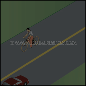 What should you do if you're driving at night and notice a cyclist approaching you? - What should you do if you're driving at night and notice a cyclist approaching you?