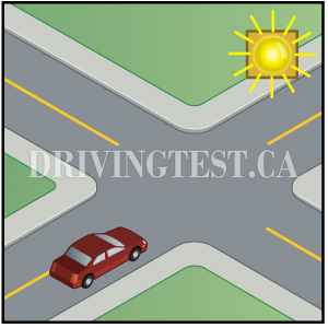 What is indicated by a flashing yellow beacon over an intersection? - What is indicated by a flashing yellow beacon over an intersection?