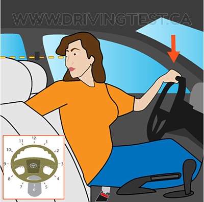 Test 3 - Where on the steering wheel should your hands be located while reversing?